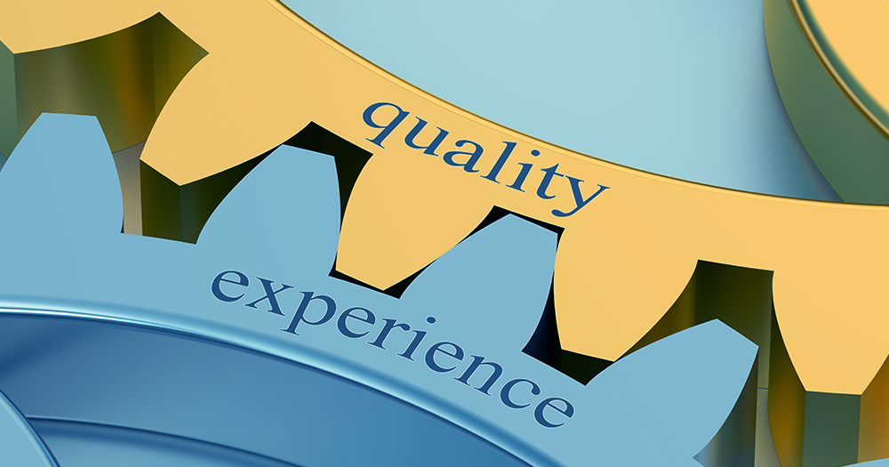 Quality and experience concept using gears to see how they lock together